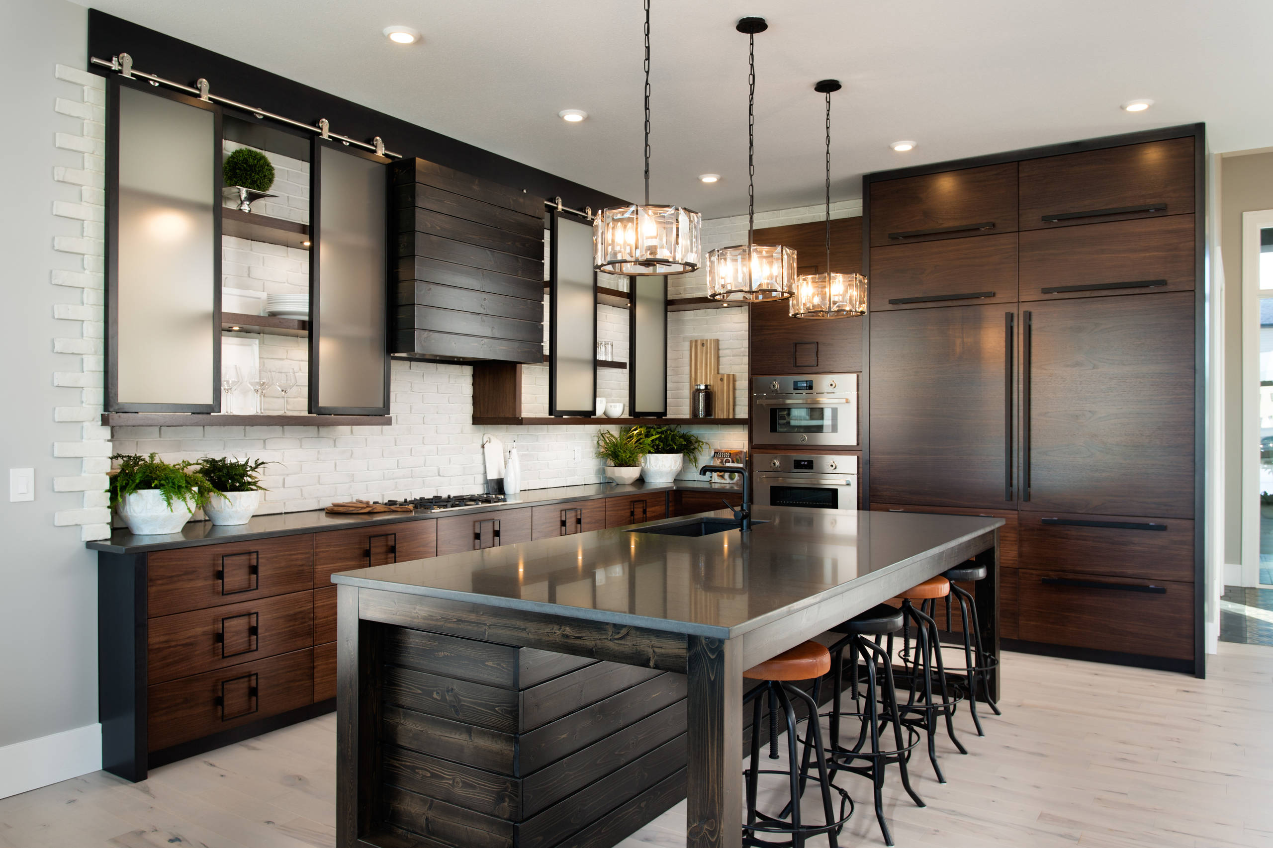Kitchen with warm pendant lighting
