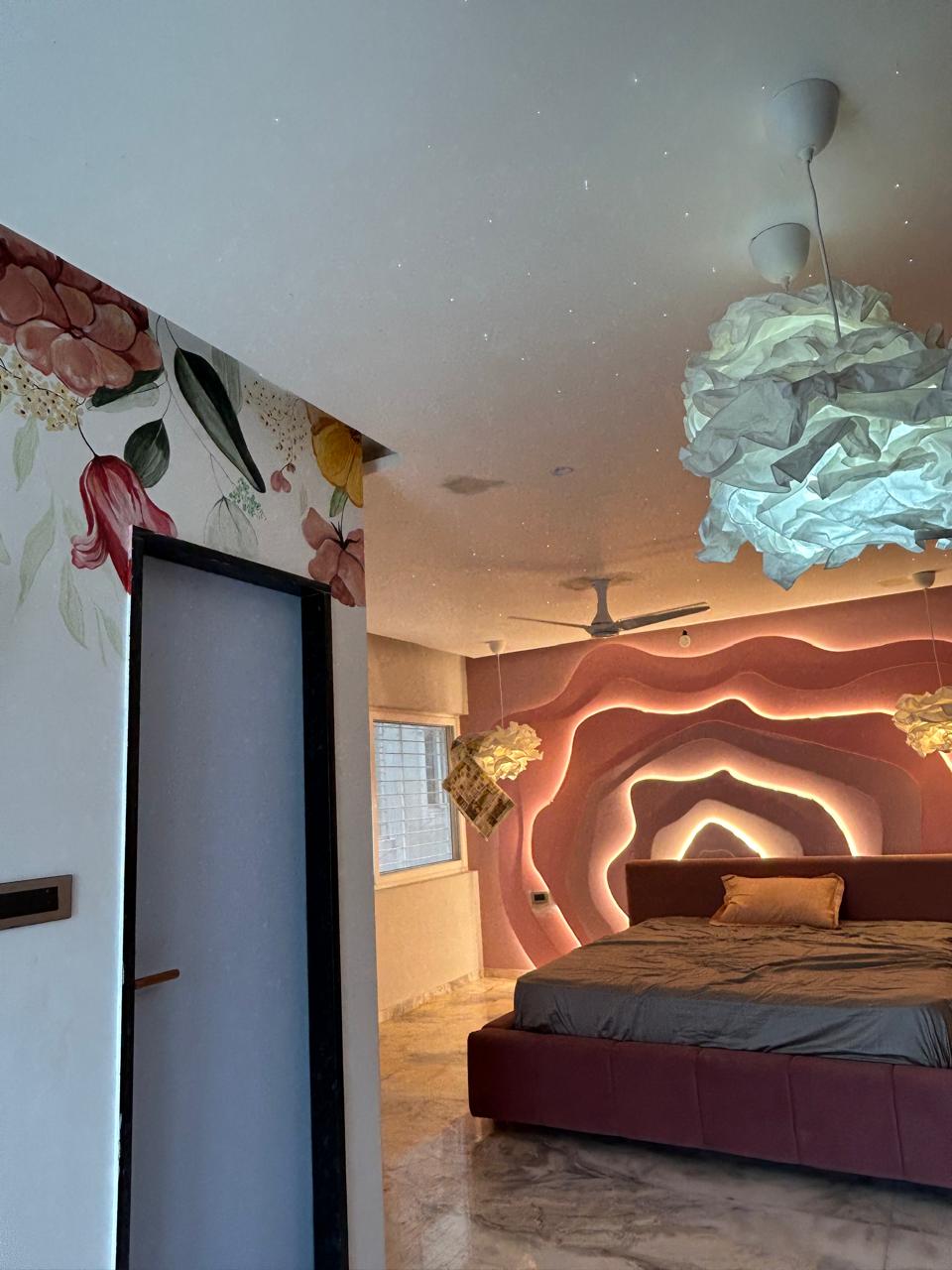 Executed floral mural bedroom with LED wave wall by Humming House